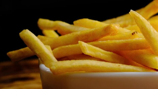 French fries on a black background