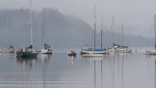 Boats near the Cowichan Bay Wharf on Vancouver Island in Cowichan Bay, British Columbia, Canada