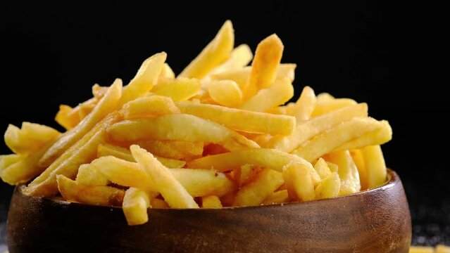 French fries on a black background