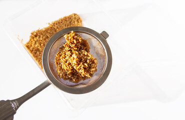 Germinated seeds in moist water. Healthy food ingredients.