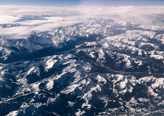 aerial view of snow covered mountains