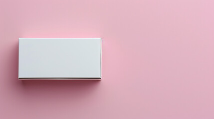 A cosmetic cream box , white, empty on a clean pink background, offering versatility for creative designs.