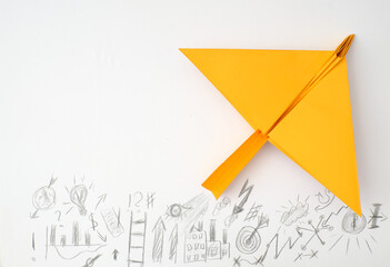 paper plane and business strategy scribble on white background, Business success, human...