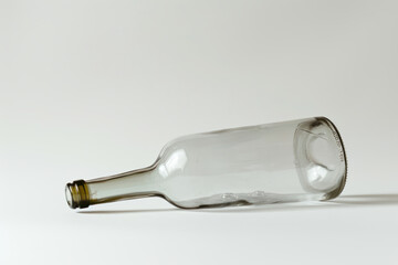 Empty wine glass bottle on an isolated white background 