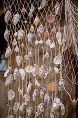 Colorful shell curtain. Maritime party decorations.