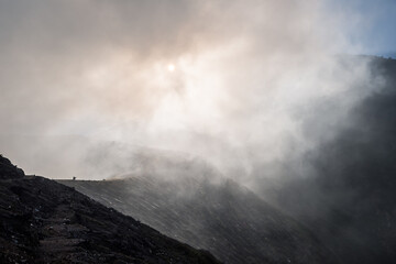 A path toward Sulfur smoke volcanic crater of Kawah Ijen mountain, Java Island, Indonesia.