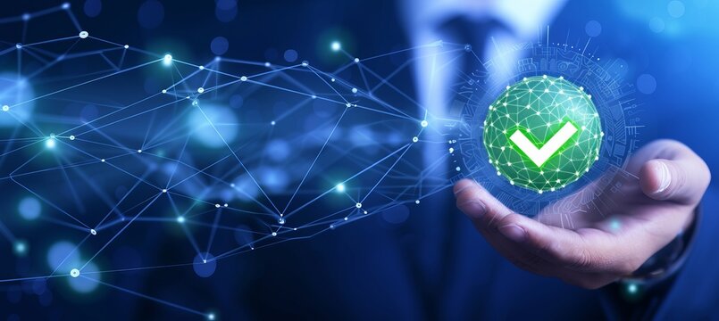 Businessman holding digital hologram of green compliance tick symbol for certification and audit
