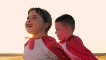 portrait girl, smile face superhero child girl, face sunset, silhouette boy girl playing superheroes red cloaks field, happy sister brother, child kid in carnival costumes, girl boy playing superhero