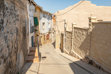 a narrow street in the old Quinto town, province of Zaragoza, Aragon, Spain