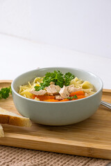Chicken noodle soup. Homemade lunch. Vertical photo
