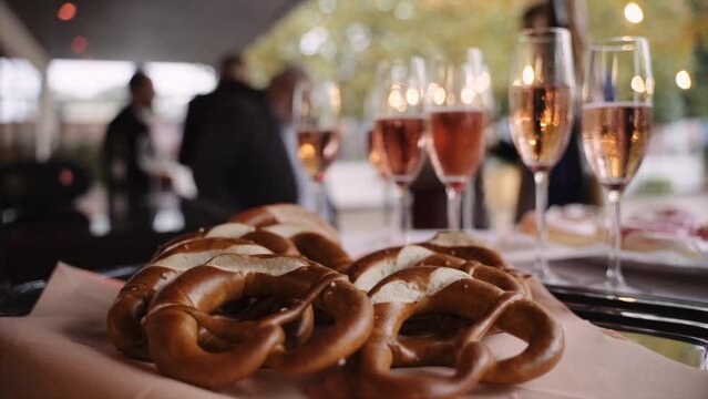 Pretzels And Wine Served At Restaurant Table