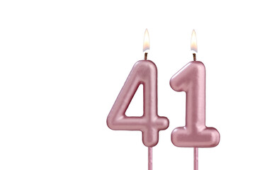 Lit birthday candle - Candle number 41 on white background