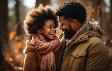 a man and a girl smiling