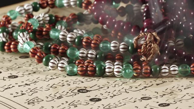 Religion The Book of Islam Quran and Rosary Beads