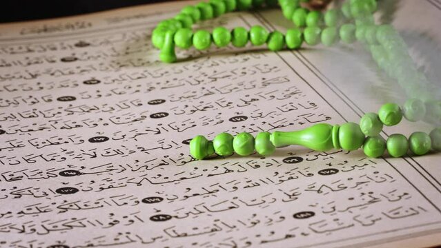 Religion The Book of Islam Quran and Rosary Beads