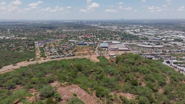 aerial view, reveal of Gaborone capital city of Botswana , view from Kgale hill