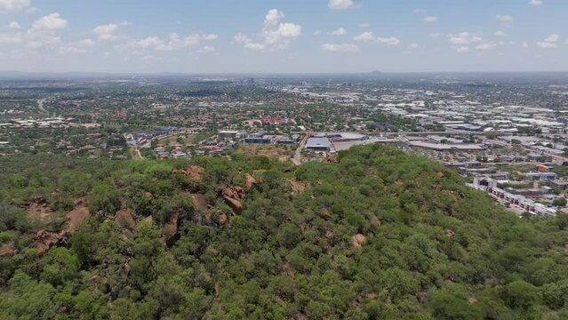 aerial view, reveal of Gaborone capital city of Botswana , view from Kgale hill