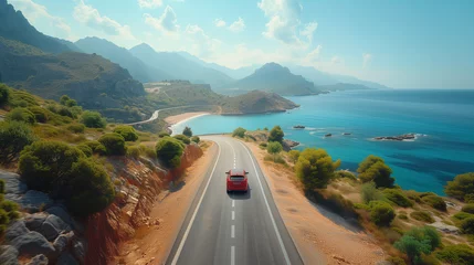 Foto op Canvas car driving on the road of Europe. road landscape in summer. it's nice to drive on the beachside highway © Fokke Baarssen