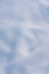 natural Snowdrift in sunny day. Nature Winter snow texture background.