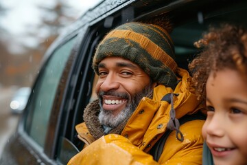 Joyous father and child share a warm embrace and smiles in a car, as they enjoy a winter road trip together - obrazy, fototapety, plakaty