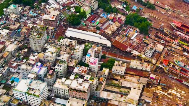 Aerial forward slums and harbor in Asia, Bangladesh, city Dhaka, third world