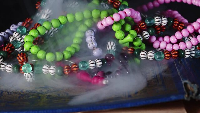 Religion The Book of Islam Quran and Rosary Beads