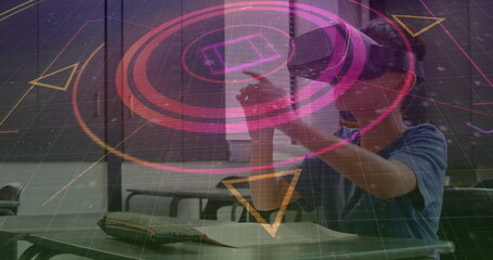 Image of scope scanning over schoolboy wearing vr headset and moving his hands