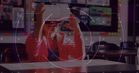 Image of scope scanning over schoolgirl wearing vr headset and moving her hands