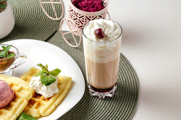 coffee with whipped cream and dessert with ice cream. coffee sho