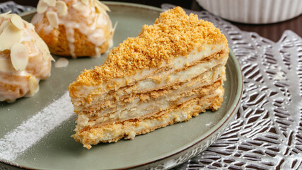 sponge cake dessert on a plate in a coffee shop on the table