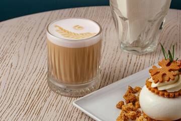 coffee with a clear glass cup on the table in the coffee shop