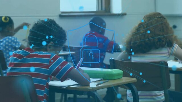 Animation of padlock and network over schoolchildren working at desks in class