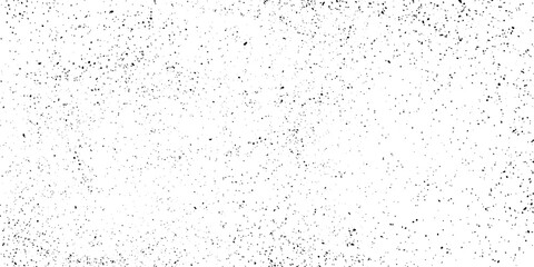 Naklejka premium Grunge black noise dots on white background. Horizontal abstract background with tiny black splash effect. Dust vector background