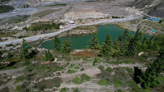 Aerial Flyover Towards Dhumba Lake in Mountain Valley Near Jomsom, Nepal