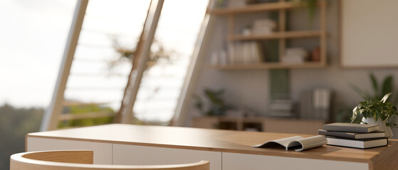 A minimal wooden work table in a cozy Scandinavian home office or living room.