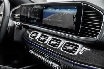 Close up car ventilation system and air conditioning - details and controls of modern car.