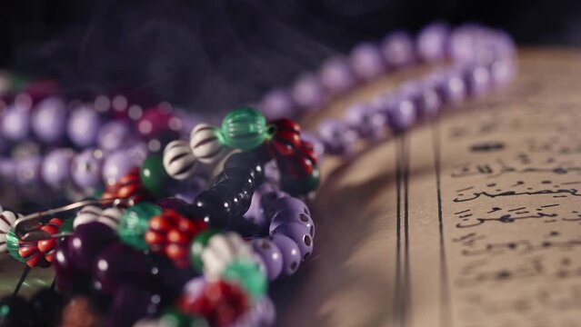 Religion The Book of Islam Quran and Rosary Beads