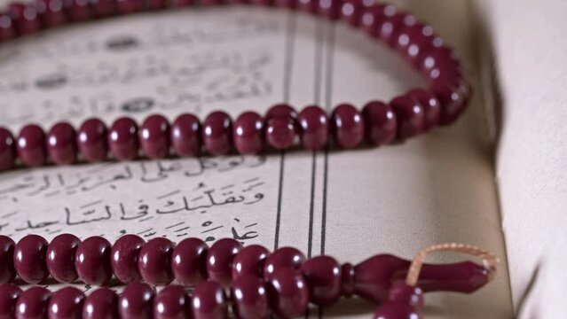 Religion The Book of Islam Quran and Rosary Beads
