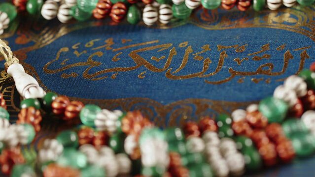 Religion The Book of Islam Quran and Rosary Beads