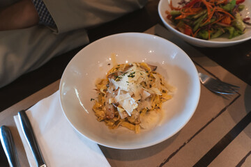 A comforting bowl of pasta and mushrooms, a classic dish enjoyed worldwide