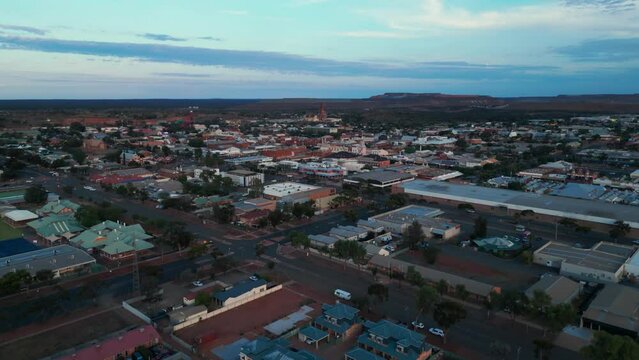 drone shot flying over Kalgoorlie Boulder at sunset, famous australian mining city in the outback, Western Australia