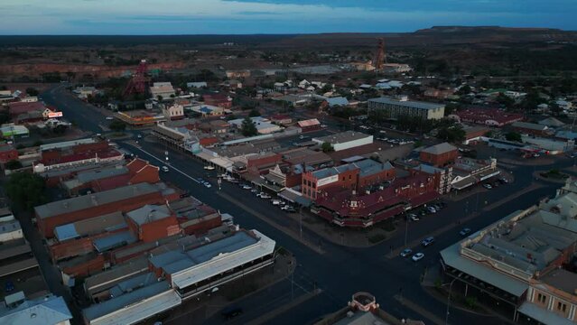 drone shot going backward over Kalgoorlie Boulder city center, famous australian mining town in western australia