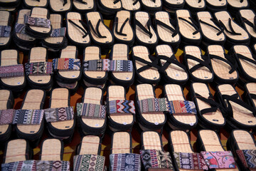View of the traditional slippers displayed in the market of Luang Prabang, Laos