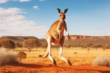 Gordijnen A kangaroo hopping across the Australian outback. Cute wallaby standing in grass at sunset, AI generated © Tanu