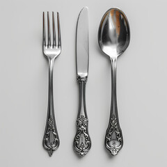 photo of a cutlery set on a flat white background