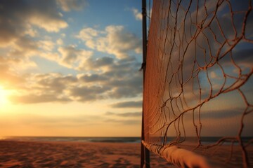 A beach volleyball net in the early morning light