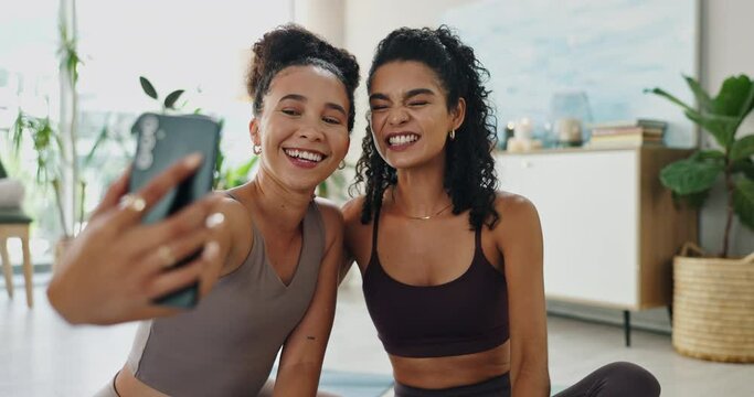 Strong, women and selfie with muscle in home with laughing, funny and flex for social media. Happy, girl friends and exercise in a lounge with profile picture of fitness and training with a smile
