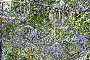 Decorative lamps in the park alley on a winter day