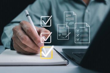 Business performance checklist, businessman using laptop doing online checklist survey, filling out digital form checklist, take an assessment, questionnaire, evaluation, online survey, online exam.