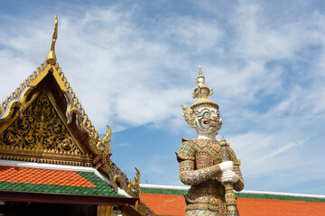 Close-up of Sahatsadecha, one of two giant statues - characters from the Ramakien epic - guarding the rear Koei Sadet Gate of the Wat Phra Kaew or Temple of the Emerald Buddha in Bangkok, Thailand 